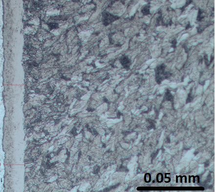 Fig. 2. Photomicrograph of 1018 steel after FNC process showing a typical compound zone. Etched with