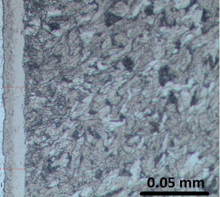 Fig. 2. Photomicrograph of 1018 steel after FNC process showing a typical compound zone. Etched with