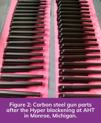 Fig. 2. Carbon steel gun parts after the Hyper blackening at AHT in Monroe, Michigan.