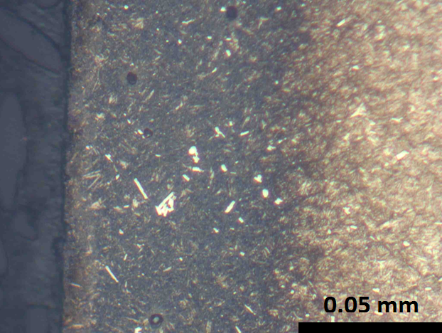 Nitrocarburizing Article - Photomicrograph of the M-50 steel after gas nitriding at very low nitridi