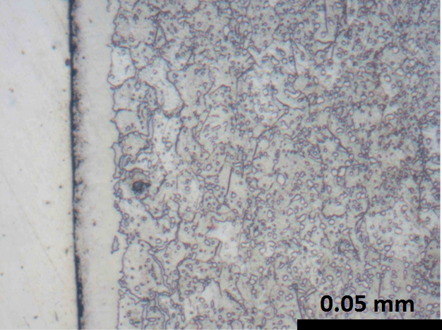 Nitrocarburizing Article - Photomicrograph of W-2 steel after gas nitriding at a high nitriding pote